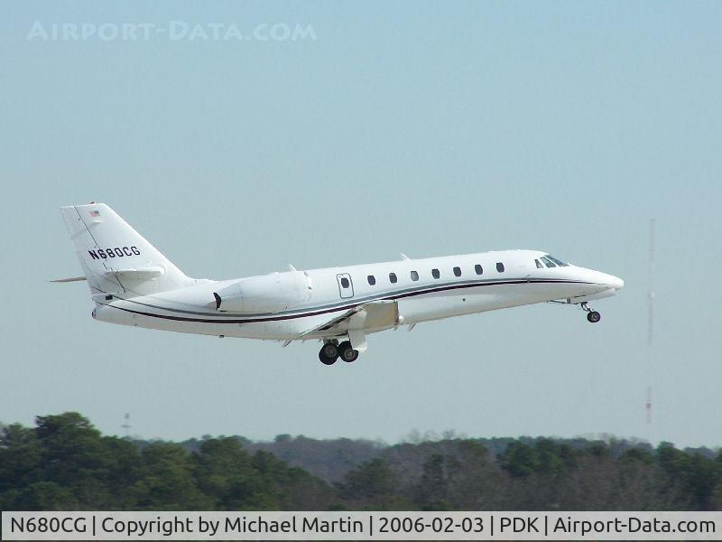 N680CG, 2005 Cessna 680 Citation Sovereign C/N 680-0044, Departing PDK - Starting to rotate gear.