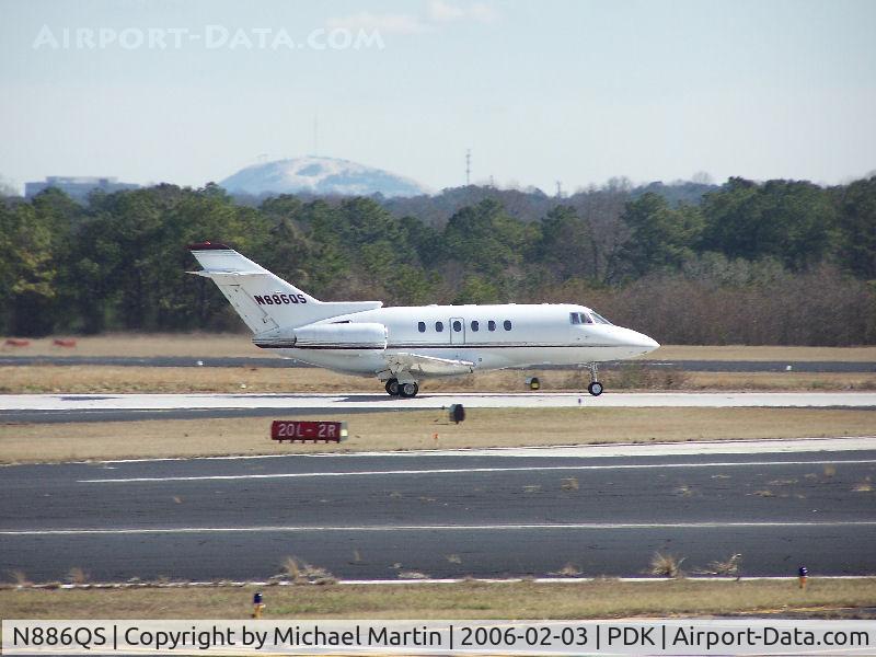N886QS, 2000 Raytheon Hawker 800XP C/N 258486, Taxing to Mercury Air Center