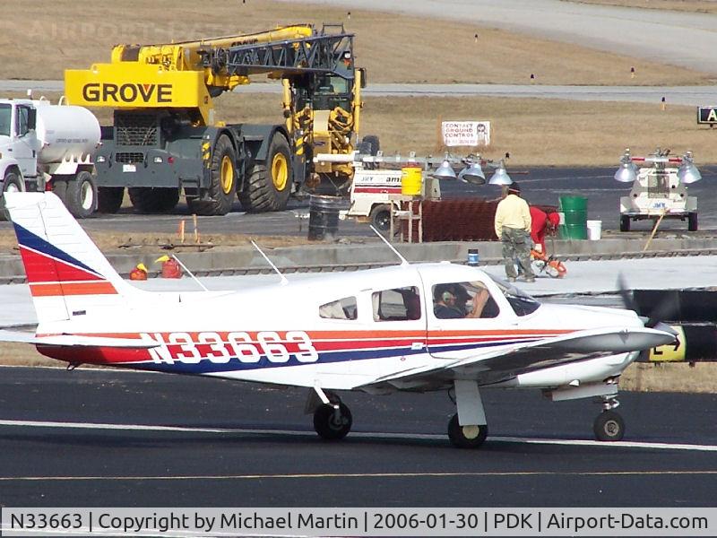 N33663, 1975 Piper PA-28R-200 C/N 28R-7535171, Taxing past on going construction
