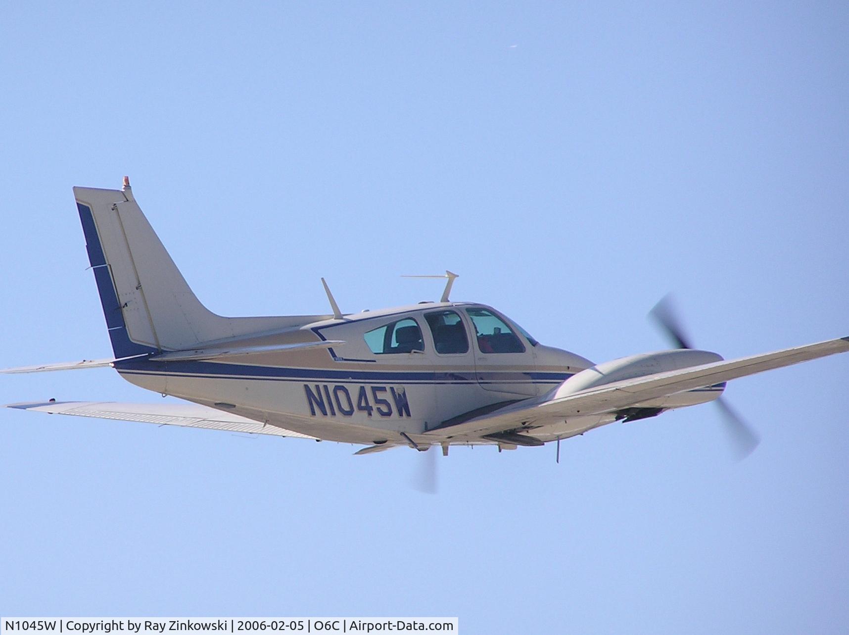 N1045W, 1973 Beech 95-B55 (T42A) Baron C/N TC-1535, Just after takeoff