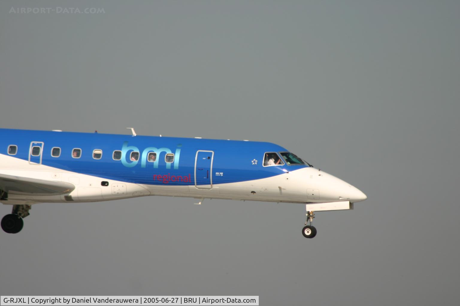 G-RJXL, 2001 Embraer ERJ-135ER (EMB-135ER) C/N 145376, watch pax and pilots (landing on rnw 02)