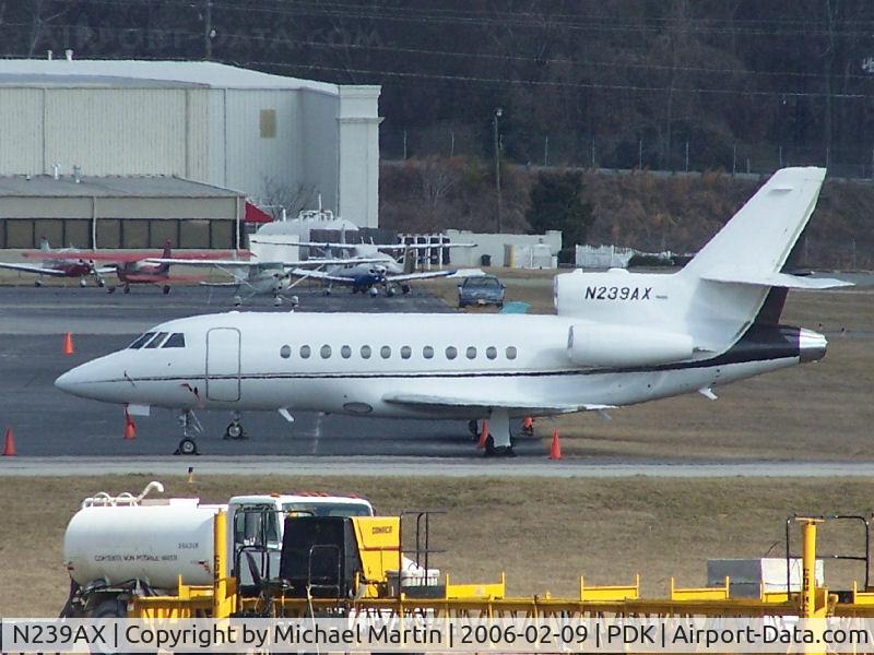 N239AX, 1987 Dassault Falcon 900 C/N 39, Tied down @ Signature Flight Services (Long range photo - pardon image)