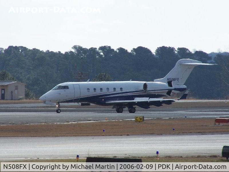 N508FX, 2004 Bombardier Challenger 300 (BD-100-1A10) C/N 20009, Landing PDK on 2R with airbrakes extended