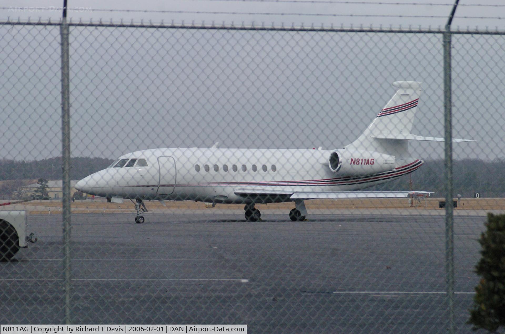 N811AG, 1999 Dassault Falcon 2000 C/N 71, white with stripes