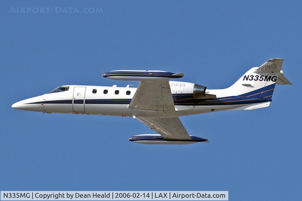 N335MG, 1987 Gates Learjet 35A C/N 626, Departing LAX South Complex.