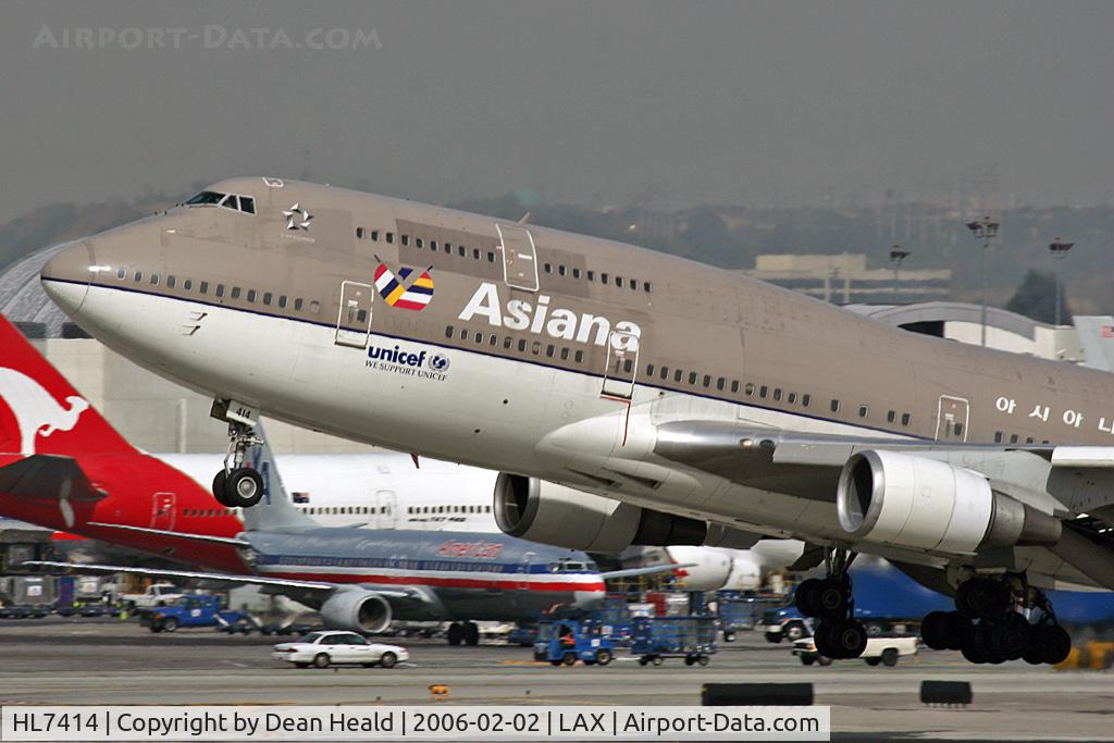 HL7414, 1991 Boeing 747-48EM(BDSF) C/N 25452, 400mm close-up of HL7414 departing 25R on a hazy day.