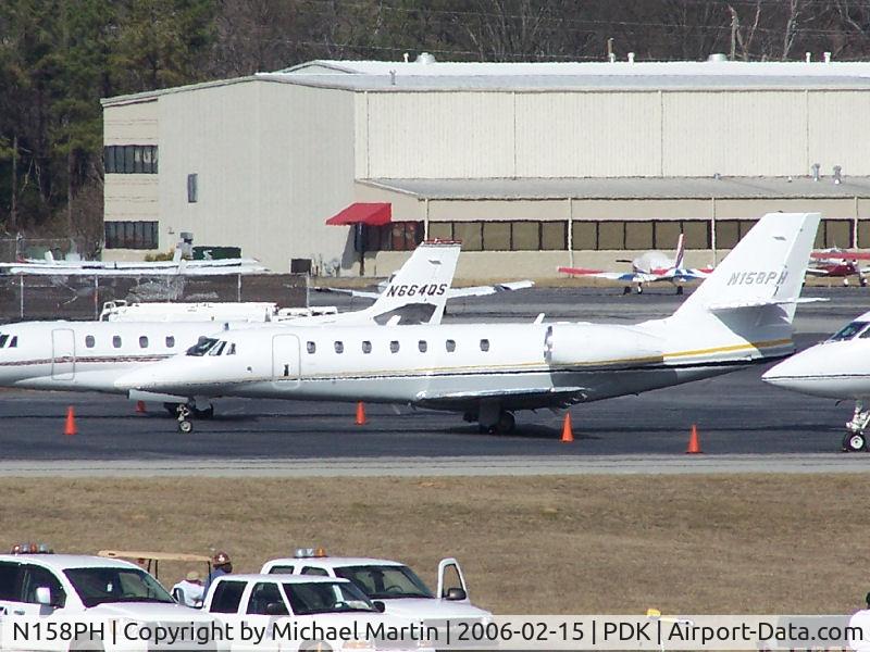 N158PH, 2005 Cessna 680 Citation Sovereign C/N 680-0049, Tied down @ Signature Flight Services (Long range photo - pardon image)