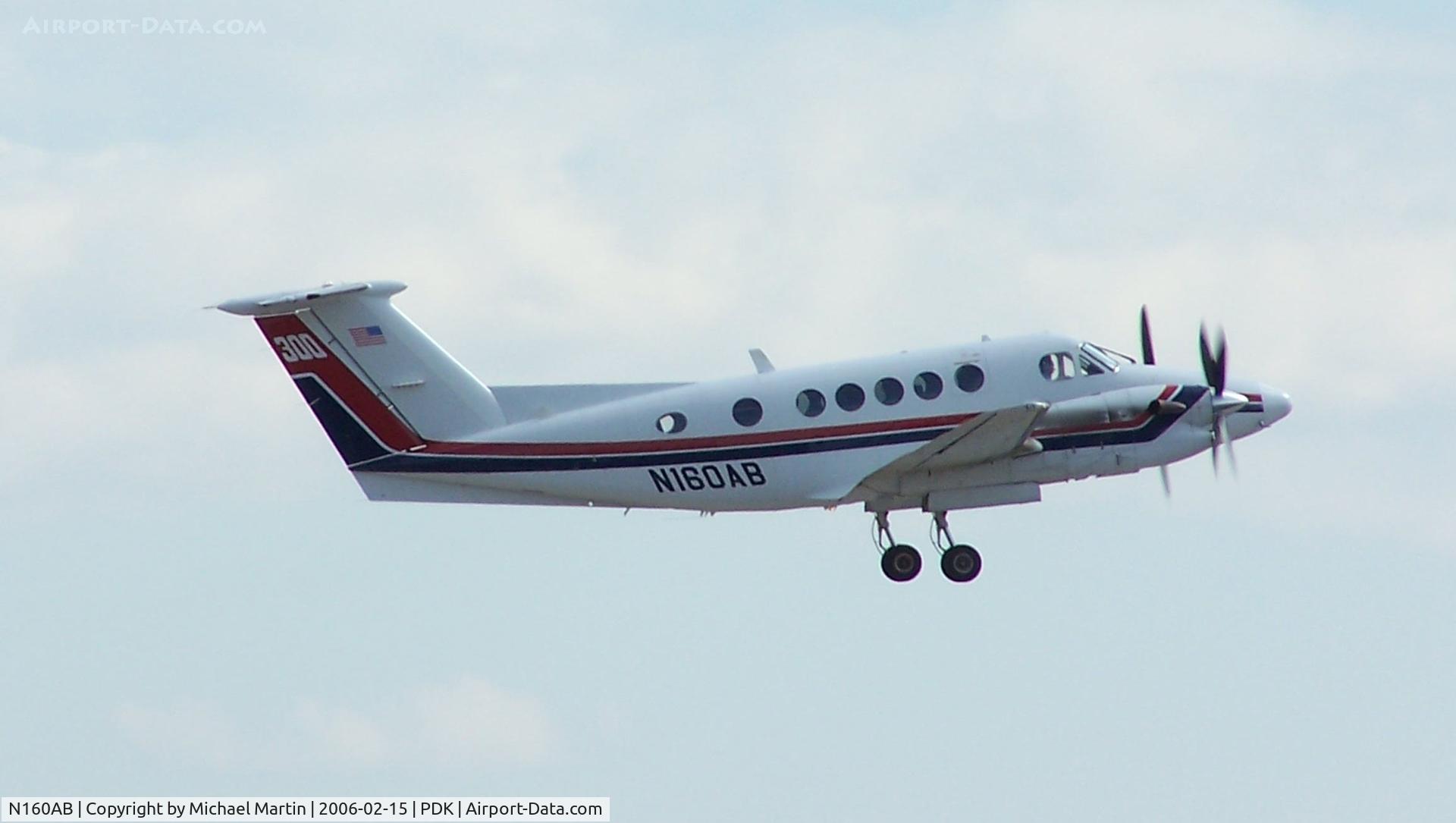 N160AB, 1991 Beech 300 C/N FA-216, Departing PDK - Starting to rotate gear.