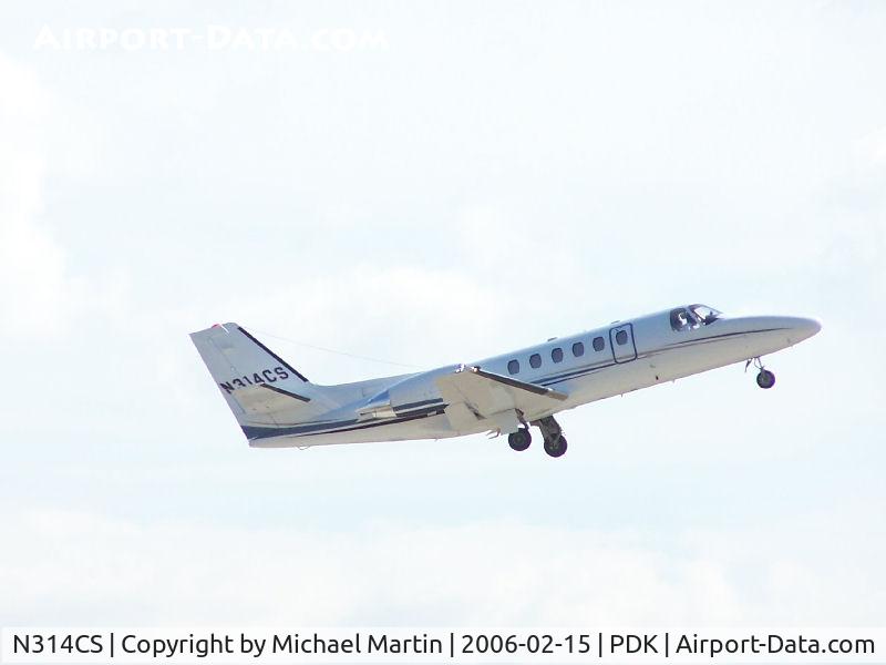 N314CS, 2001 Cessna 550 Citation Bravo C/N 550-1004, Departing PDK - Starting to rotate gear.