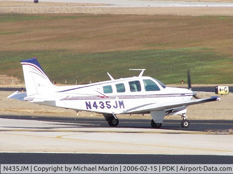 N435JM, 1975 Beech A36 Bonanza 36 C/N E-762, Taxing to 20R