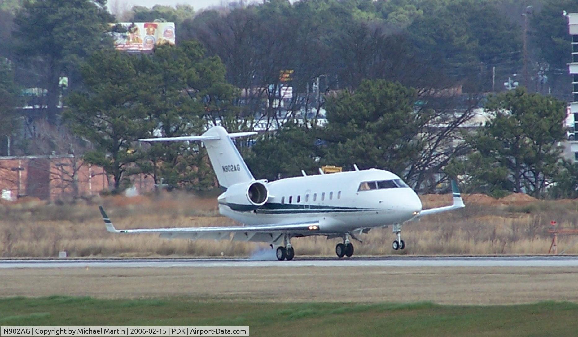 N902AG, 2001 Bombardier Challenger 604 (CL-600-2B16) C/N 5512, Smoking Tires Landing 20L