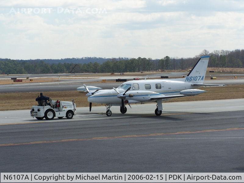 N6107A, 1978 Piper PA-31T C/N 31T-7820087, Being towed to parking at Epps Air Service