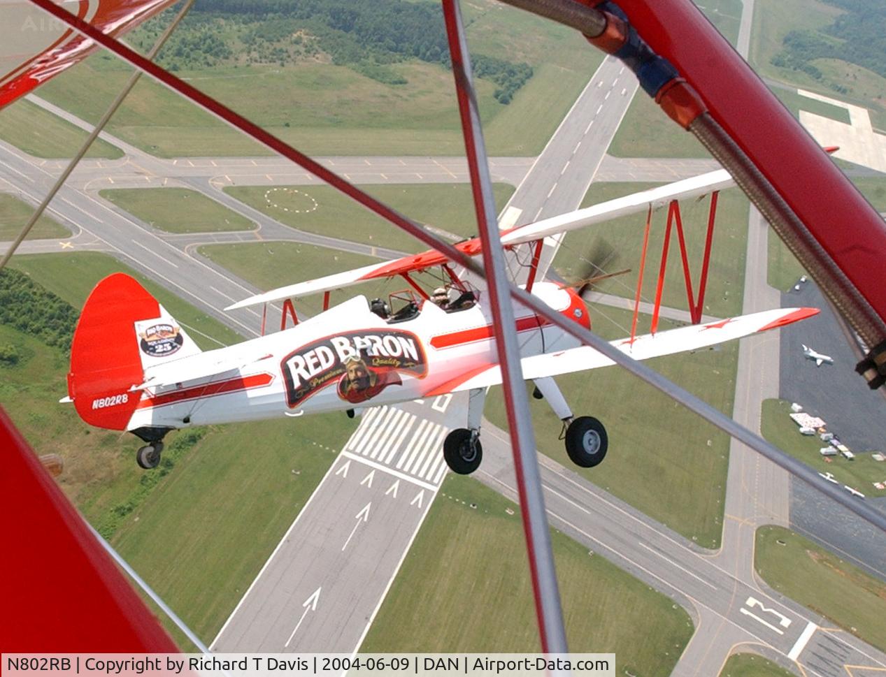 N802RB, 1943 Boeing E75 C/N 75-6451, Flying with the Red Baron Pizza planes over Danville Va.