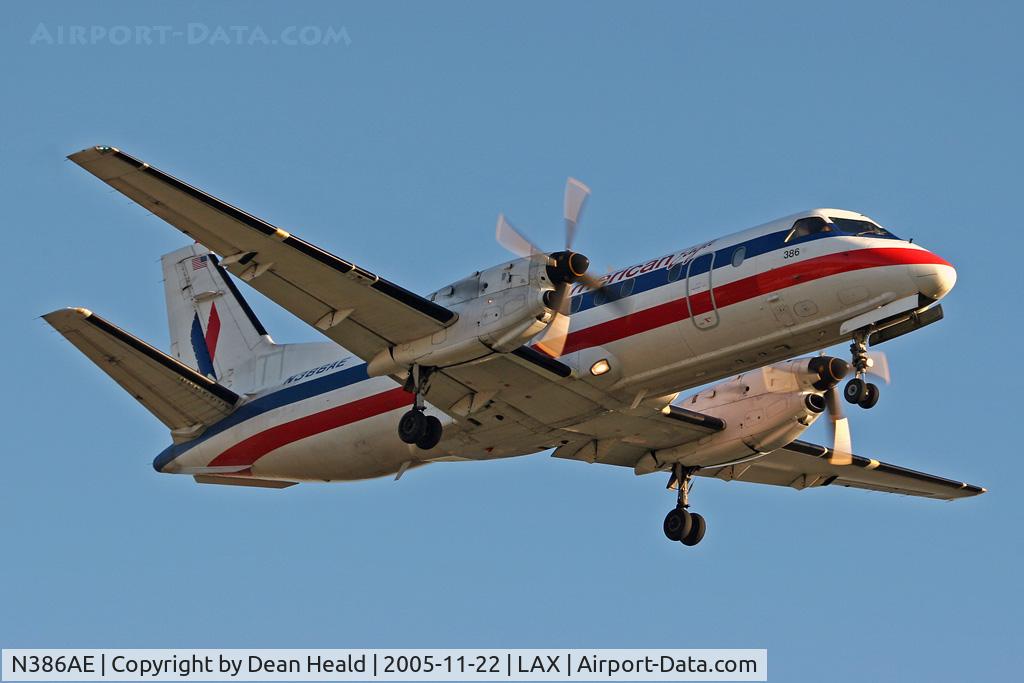 N386AE, Saab 340B C/N 340B-386, On very short final approach to RWY 24R - North Complex.