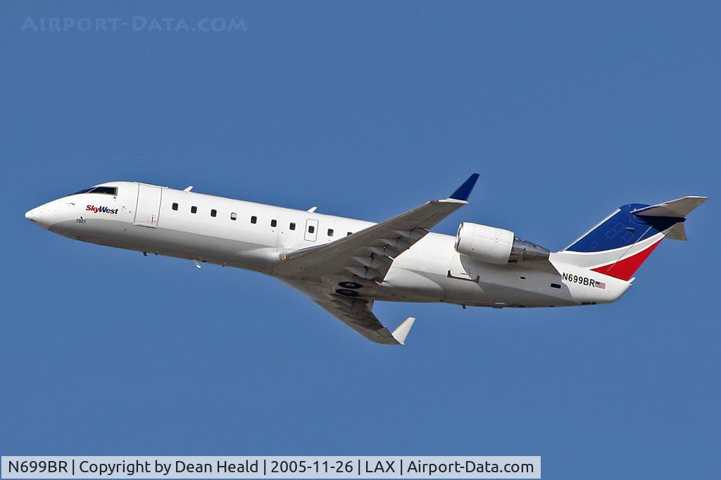 N699BR, 2003 Bombardier CRJ-200ER (CL-600-2B19) C/N 7801, Skywest N699BR departing RWY 25R on a clear Saturday in late November.