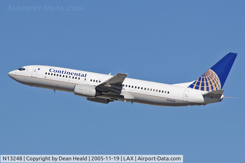 N13248, 1999 Boeing 737-824 C/N 28808, Departing RWY 25R on a clear November day.