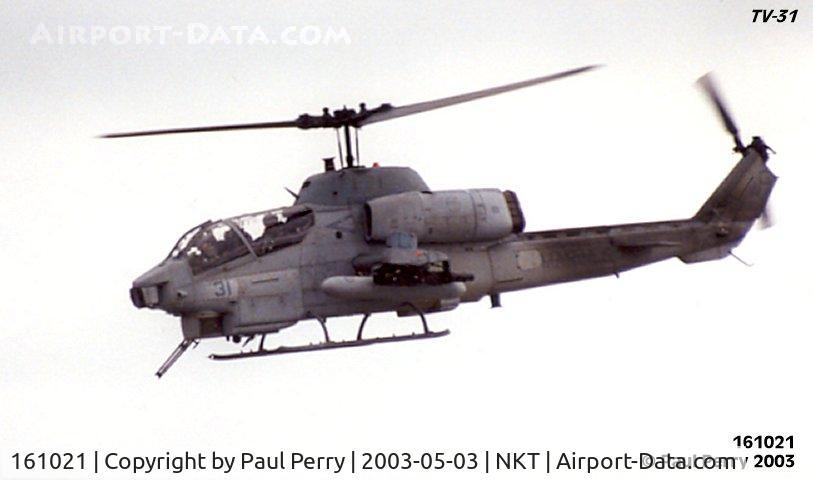 161021, Bell AH-1W Super Cobra C/N 26926, The gunner is playing the M-197 cannon around, and it looks menacing!