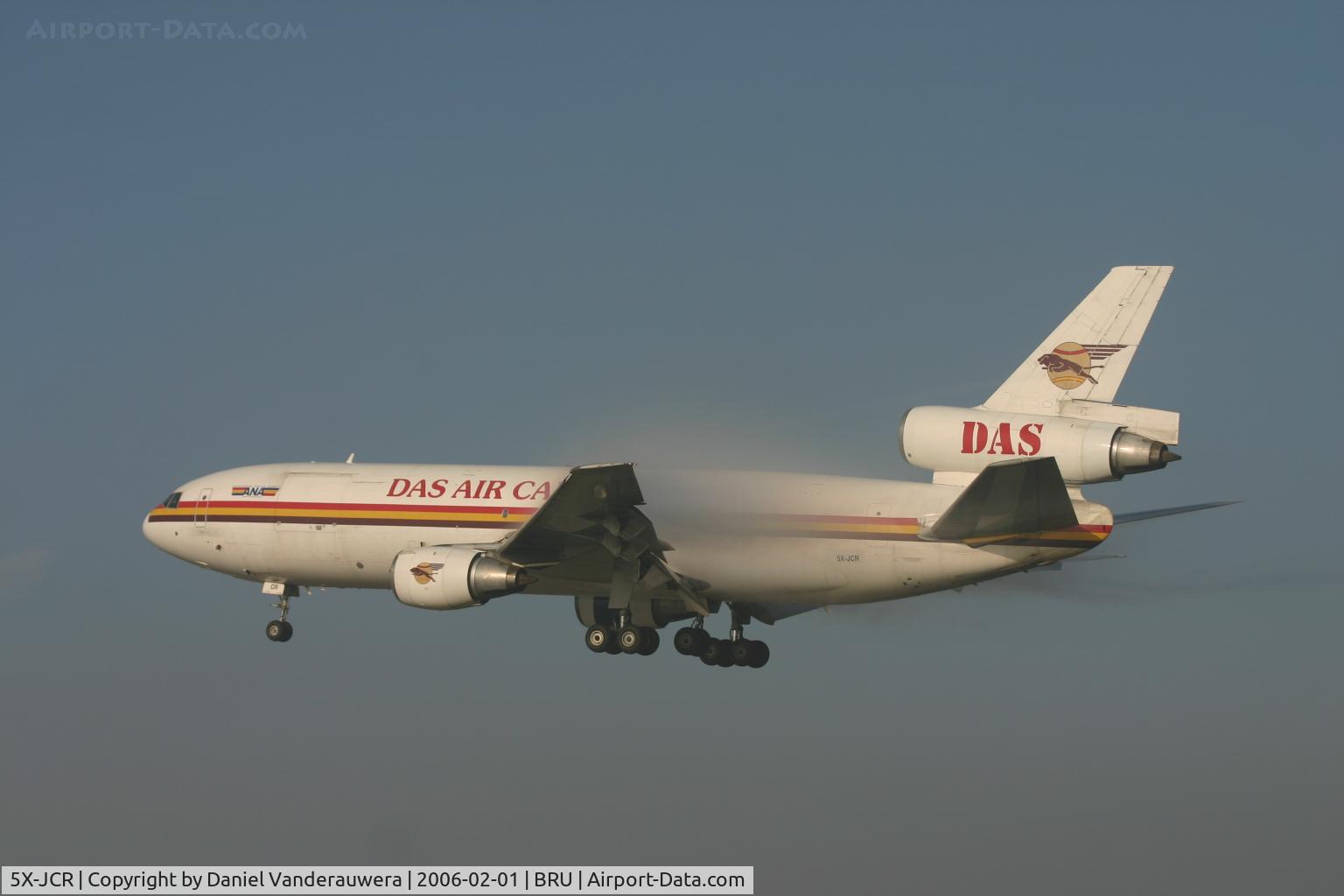 5X-JCR, 1980 McDonnell Douglas DC-10-30F C/N 47831, watch the effect of humid air on wings
