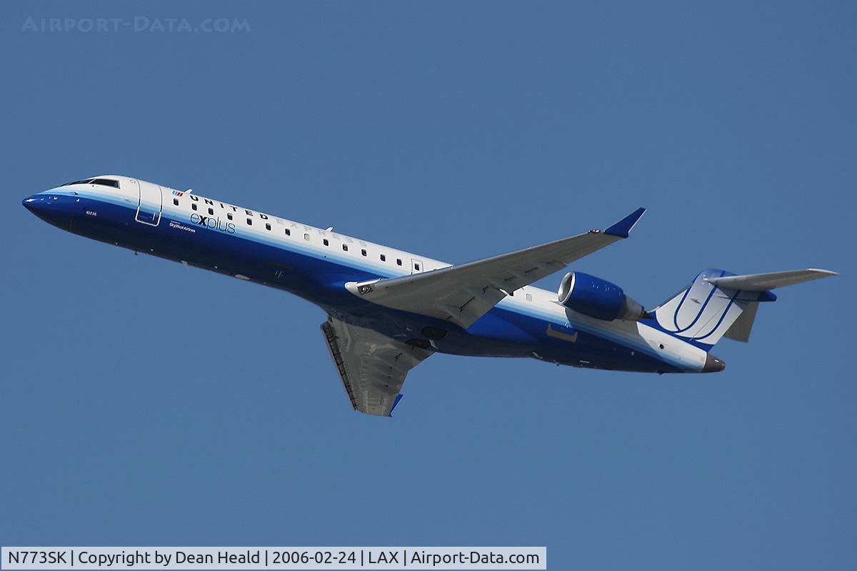 N773SK, 2005 Bombardier CRJ-702 C/N 10236, United Express N773SK departing LAX RWY 25R.