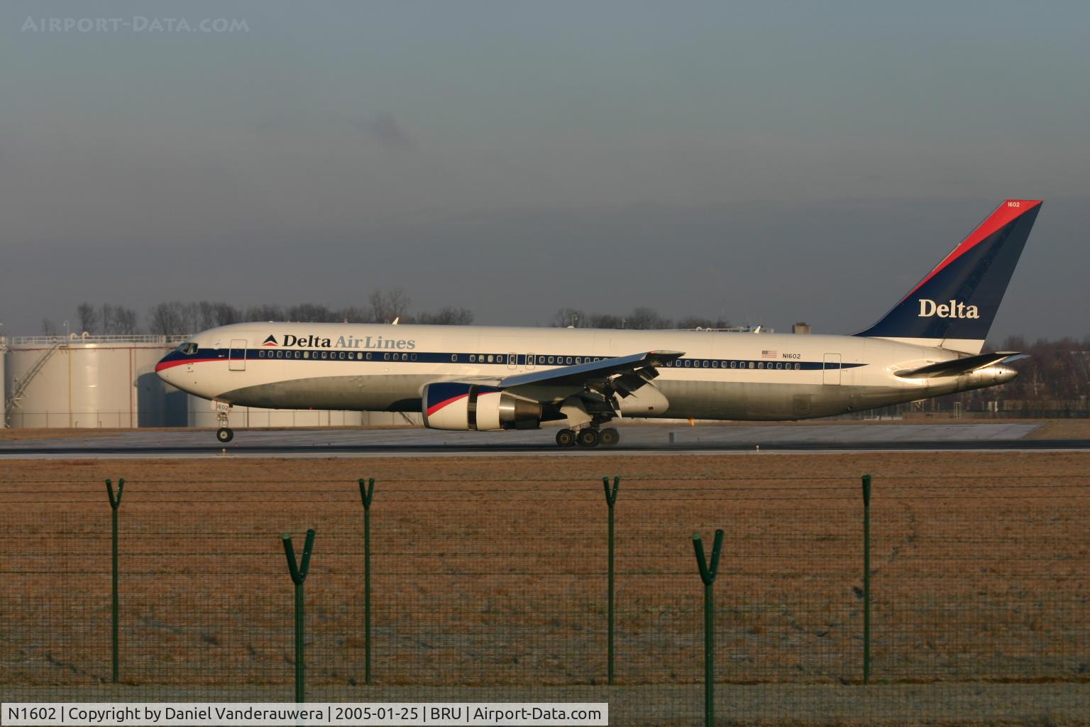 N1602, 1999 Boeing 767-332 C/N 29694, still front wheels to touch rnw 25L