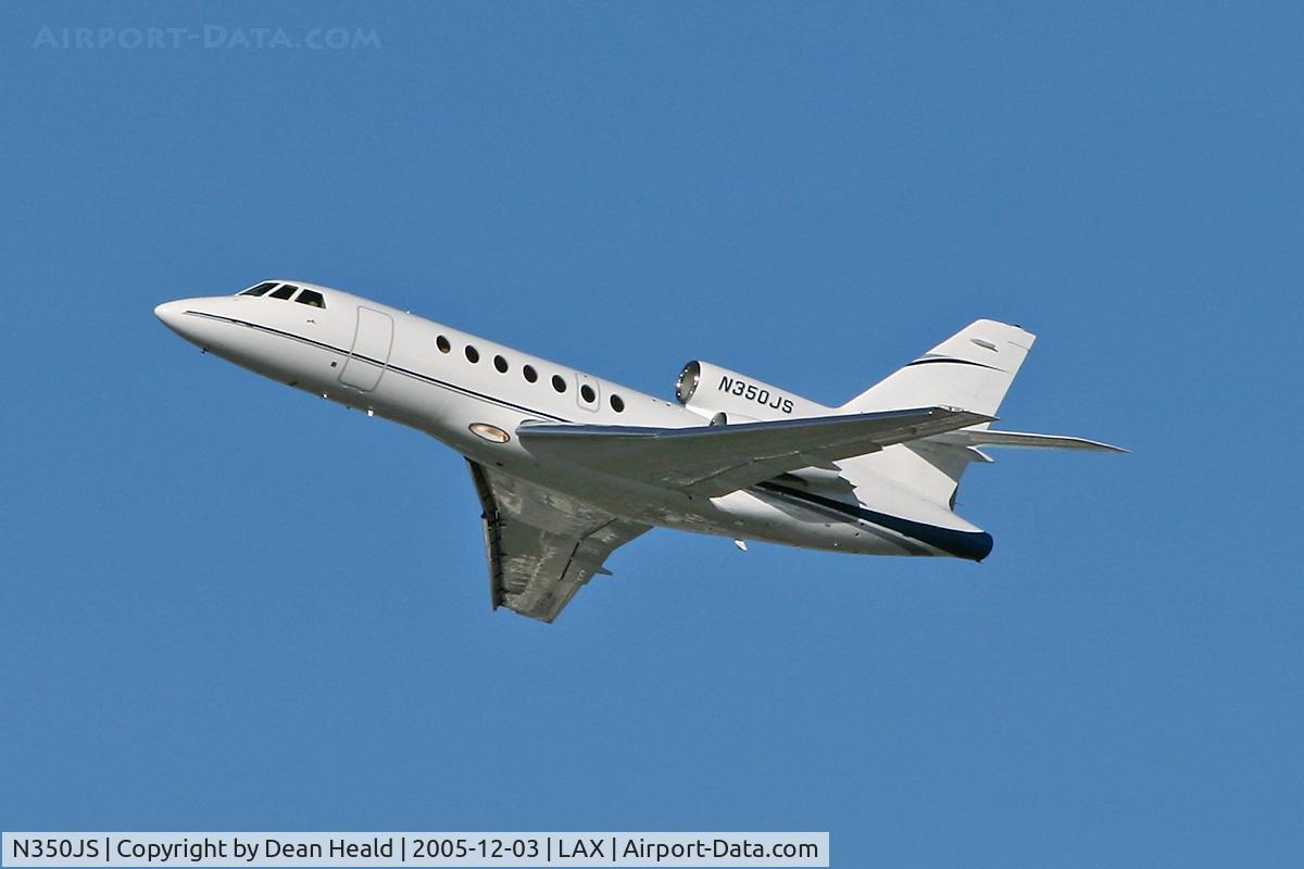 N350JS, 1980 Dassault Mystere Falcon 50 C/N 15, Departing RWY 25R on a clear December day.