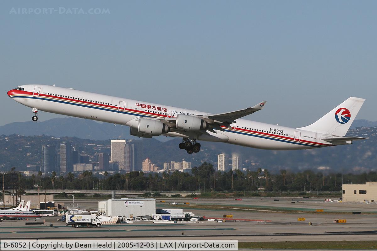 B-6052, 2003 Airbus A340-642 C/N 514, China Eastern B-6052 departing LAX RWY 25R.