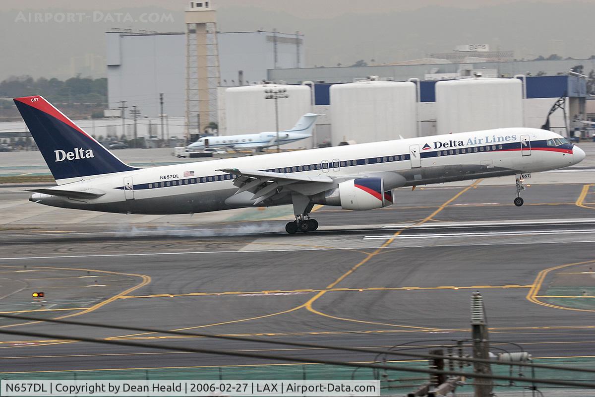 N657DL, 1990 Boeing 757-232 C/N 24419, Delta Airlines N657DL touching down on RWY 7R.