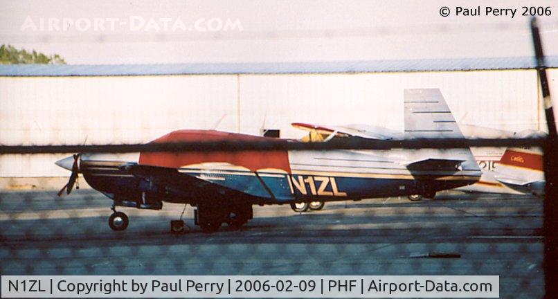 N1ZL, 1981 Mooney M20J 201 C/N 24-1238, Fences...good for safety, but bad for photography.  Well kept Mooney was just too much of an enticement