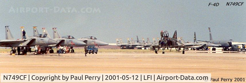 N749CF, 1965 McDonnell F-4D Phantom II C/N 1813 (65-0749), Steve Ritchie gearing up for his flight.  You can see him on the starboard intake of the Phantom