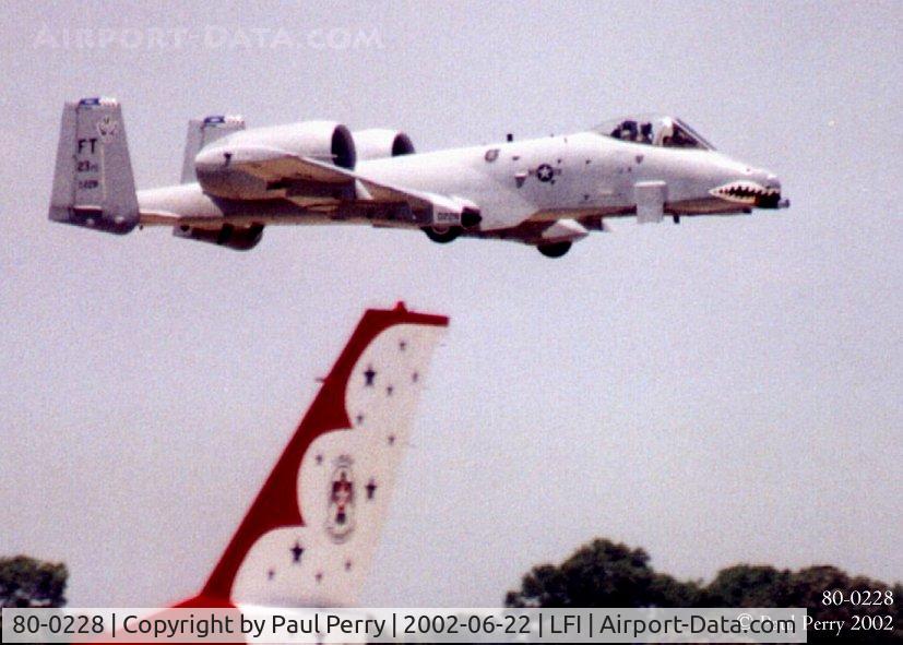 80-0228, 1980 Fairchild Republic A-10C Thunderbolt II C/N A10-0578, Quite a contrast, the sleek tail of an F-16, and the pugnacious pulchritude of the Warthog