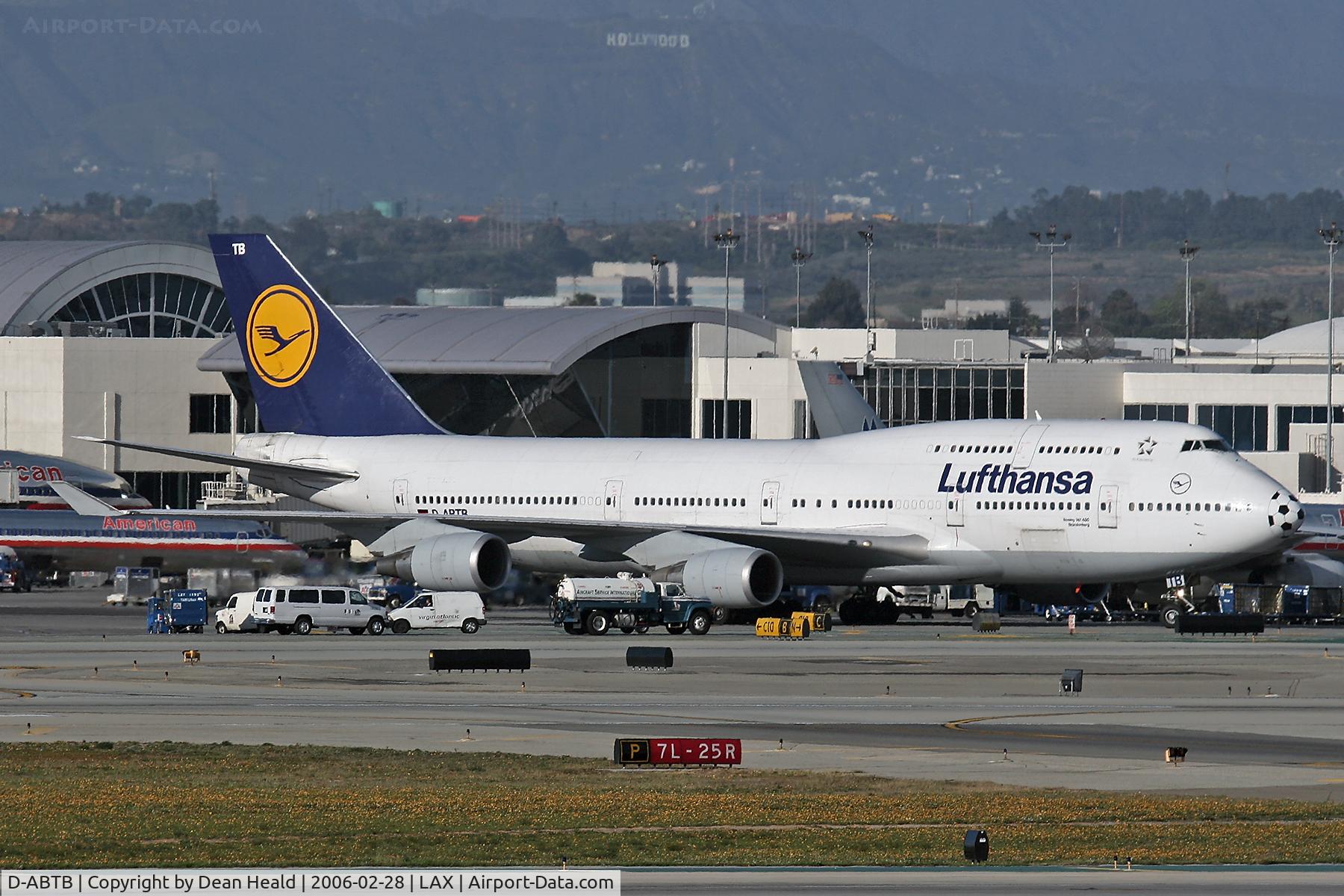 D-ABTB, 1989 Boeing 747-430M C/N 24286, Lufthansa D-ABTV leaving the terminal area at LAX enroute to departure.