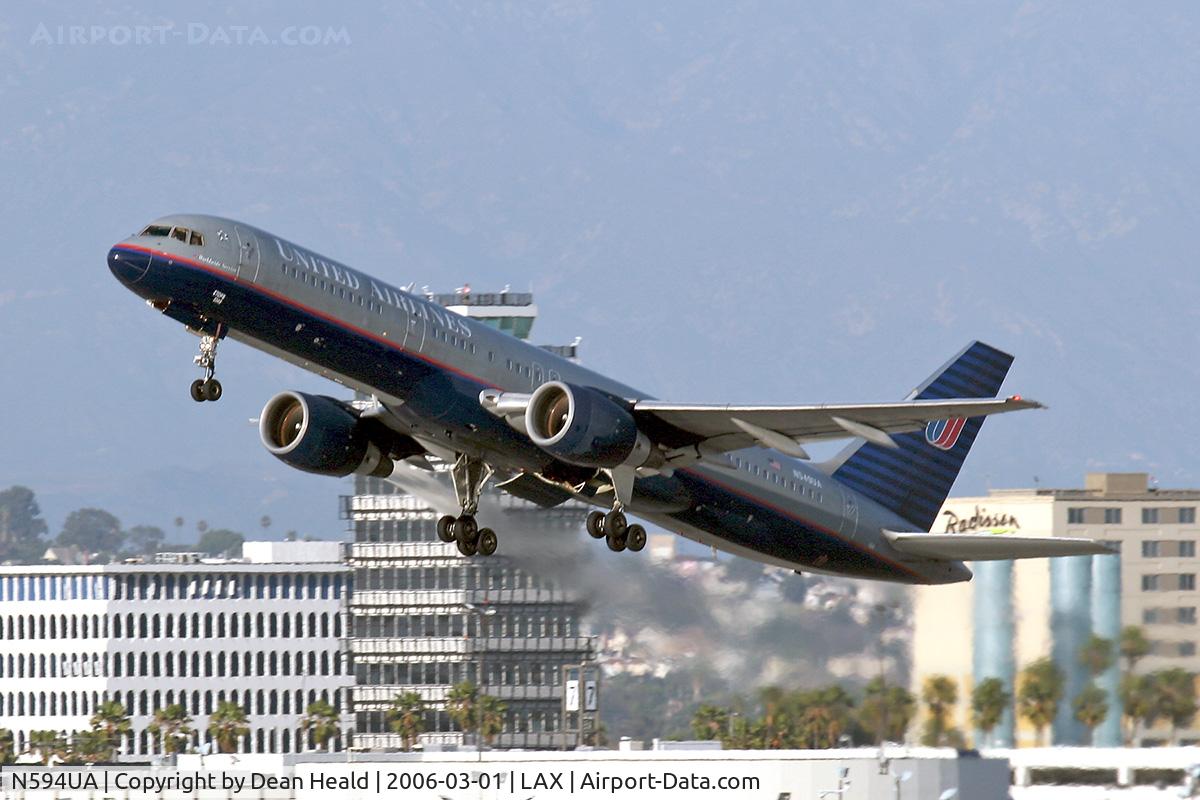 N594UA, 1996 Boeing 757-222 C/N 28145, United Airlines N594UA departing LAX RWY 25R on a late afternoon in March 2006.
