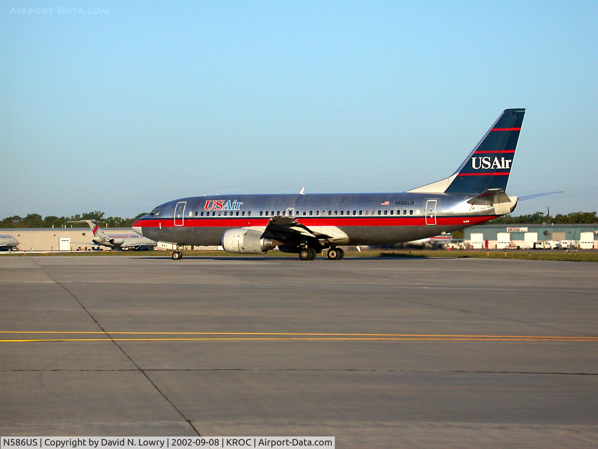 N586US, 1988 Boeing 737-301 C/N 23931, On the ramp at KROC in old colors.
