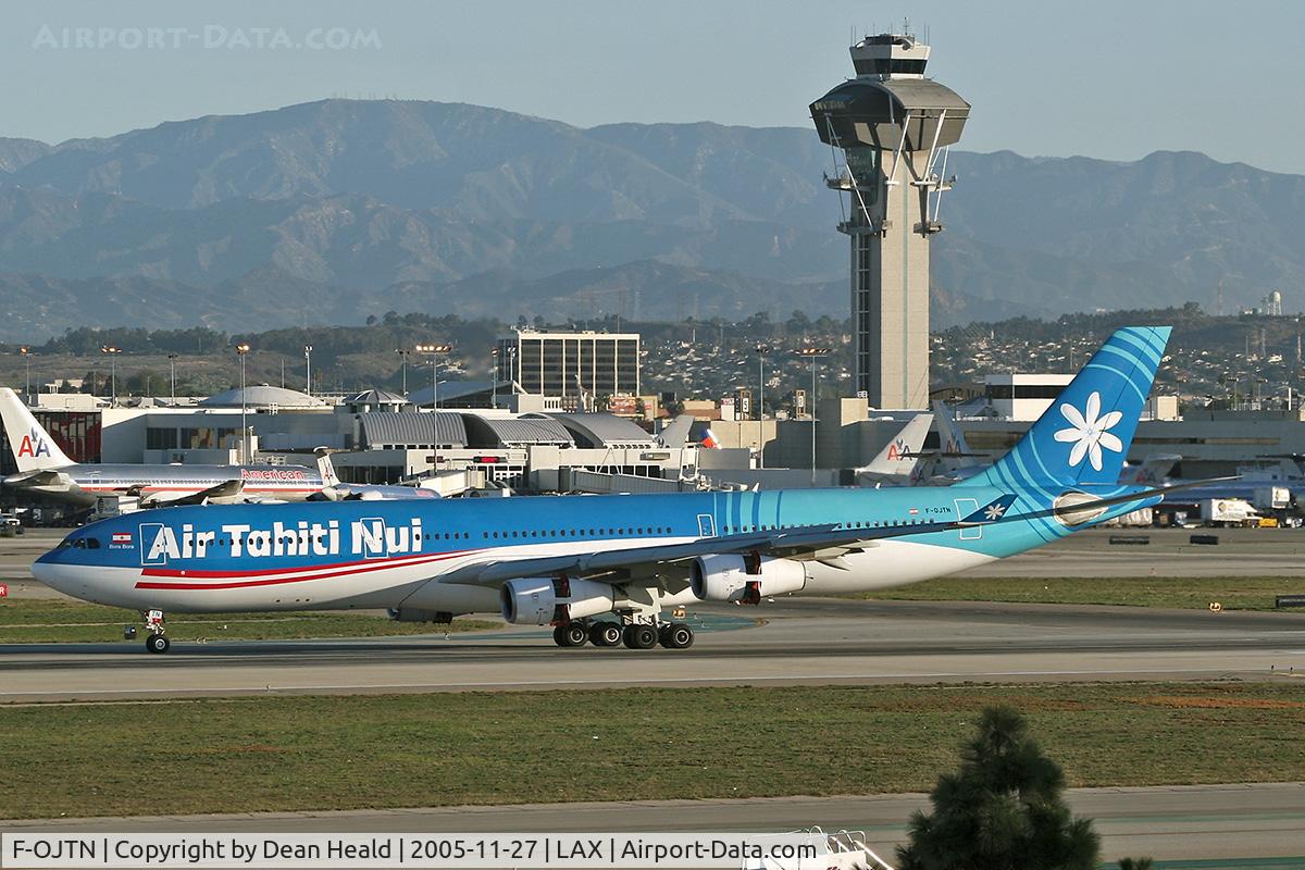 F-OJTN, 2001 Airbus A340-313 C/N 395, Air Tahiti Nui F-OJTN (A340-313) rolling out after landing on LAX RWY 25L.