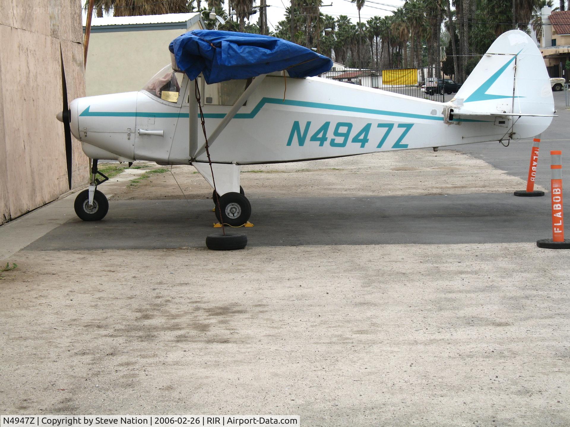 N4947Z, 1961 Piper PA-22-108 Colt C/N 22-8543, 1961 Piper PA-22-108 with blue tarp at Flabob Airport (Riverside, CA) just before the storm!