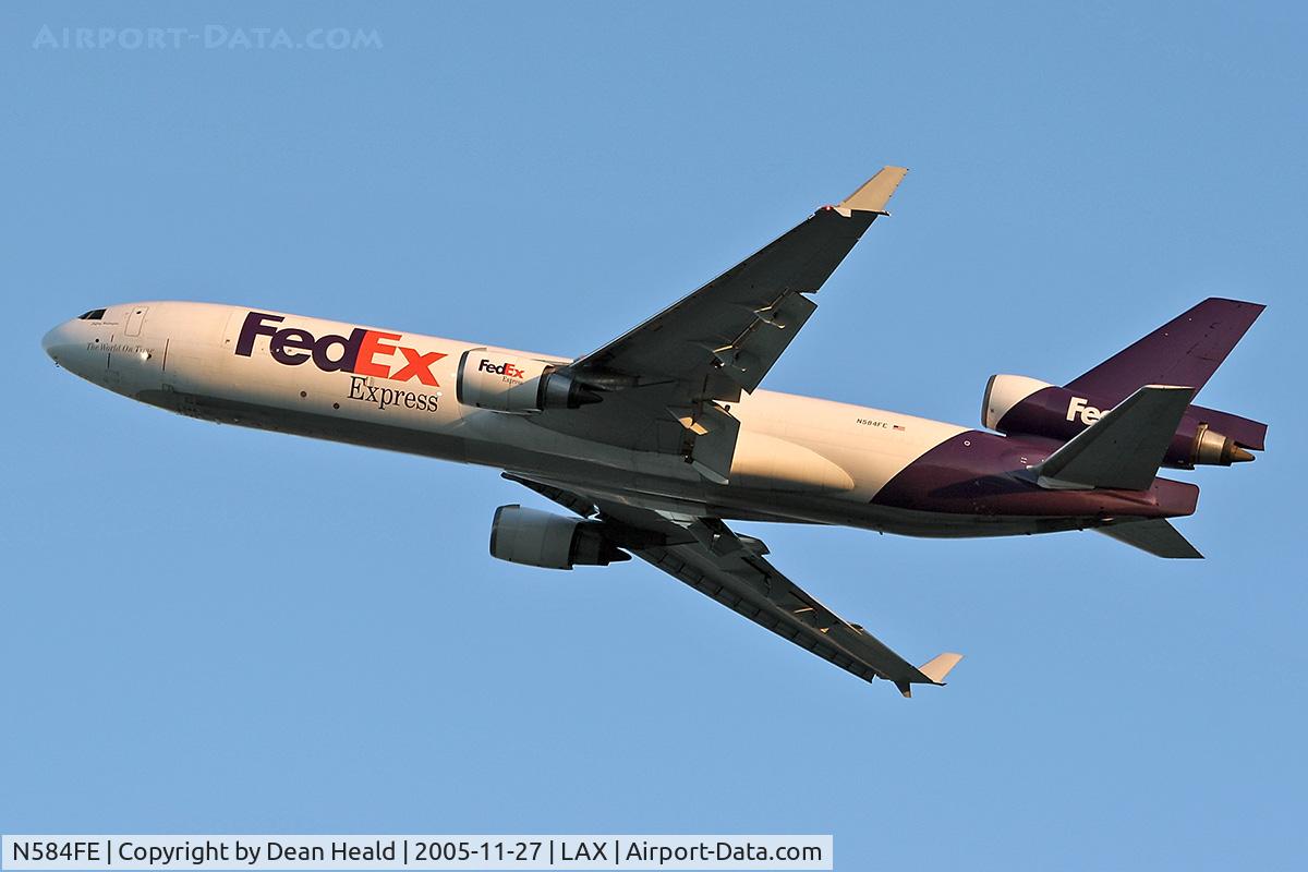 N584FE, 1992 McDonnell Douglas MD-11F C/N 48436, FedEx N584FE (MD-11F) departing LAX RWY 25L on an early morning in November.