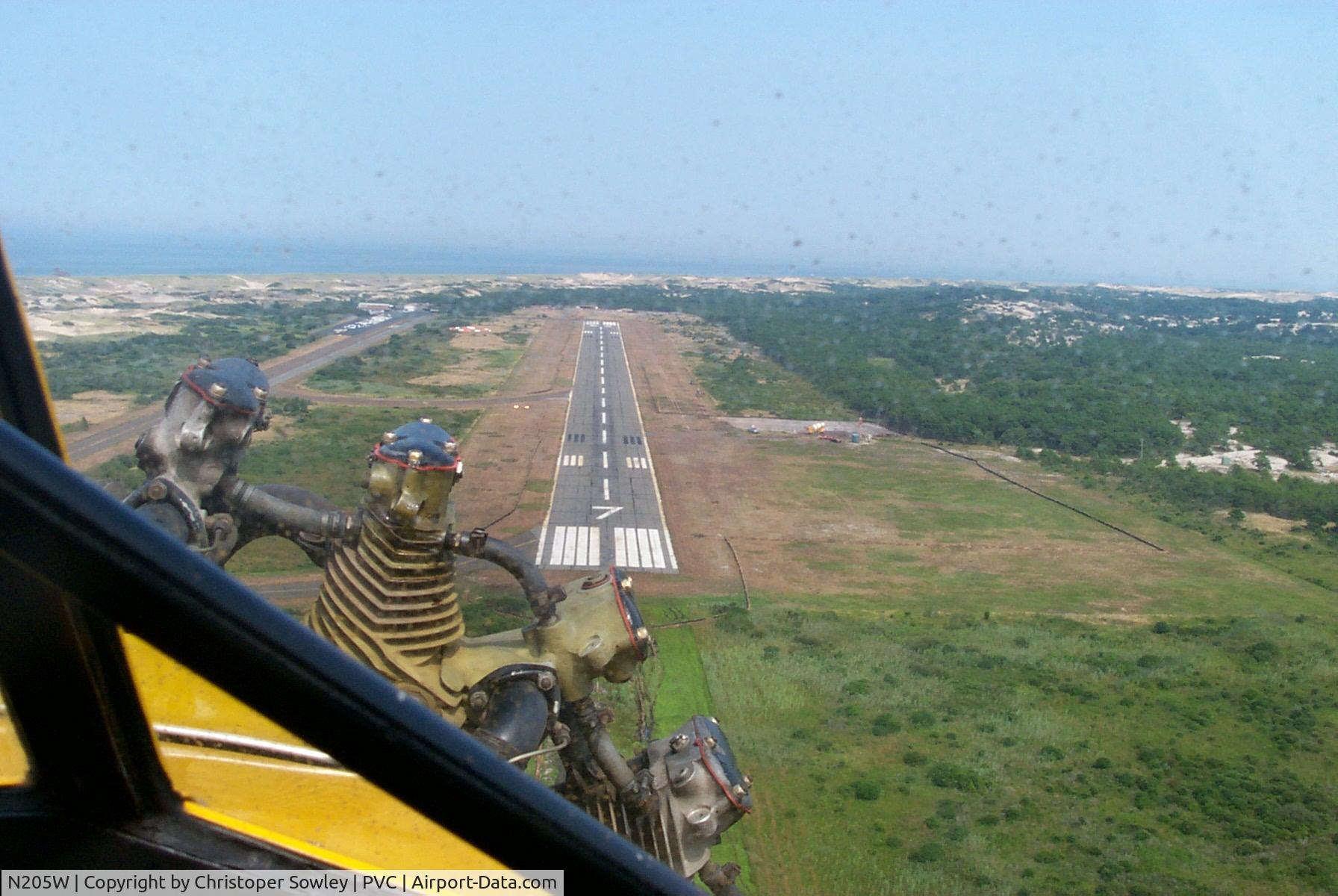 N205W, 1930 Stinson SM-8A Junior C/N 4029, landing at Provincetown Municipal, steep approach