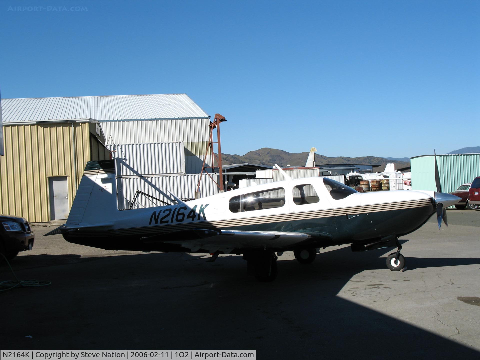 N2164K, 1998 Mooney M20R Ovation C/N 29-0172, 1998 Mooney M20R in shadows at Lampson Field (Lakeport), CA