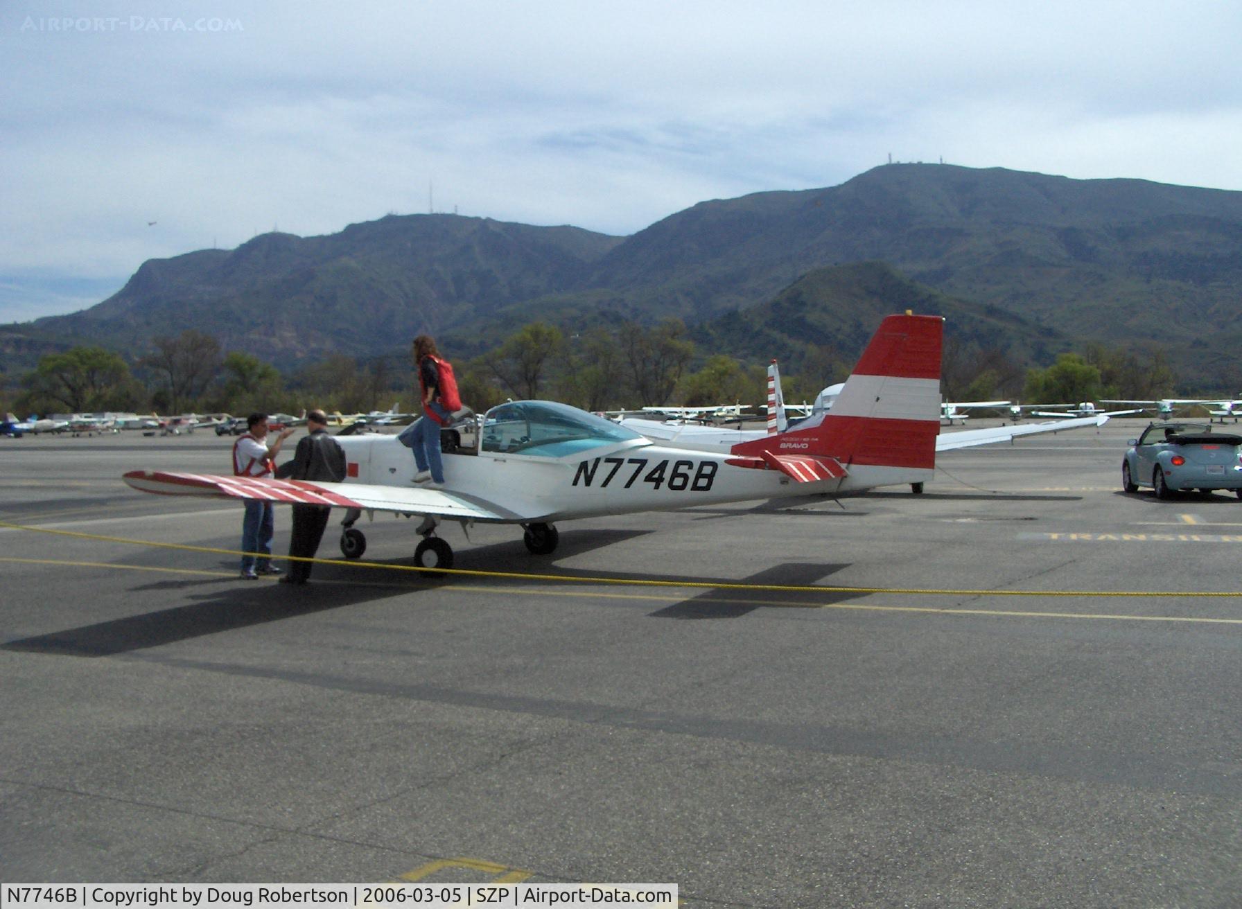 N7746B, 1992 FFA AS-202/18A-4 Bravo C/N 238, 1992 Ffa Flugzeugwerke Altenrhein AS-202/18A4 BRAVO, Lycoming AEIO-360, Departing visitor-note parachutes worn