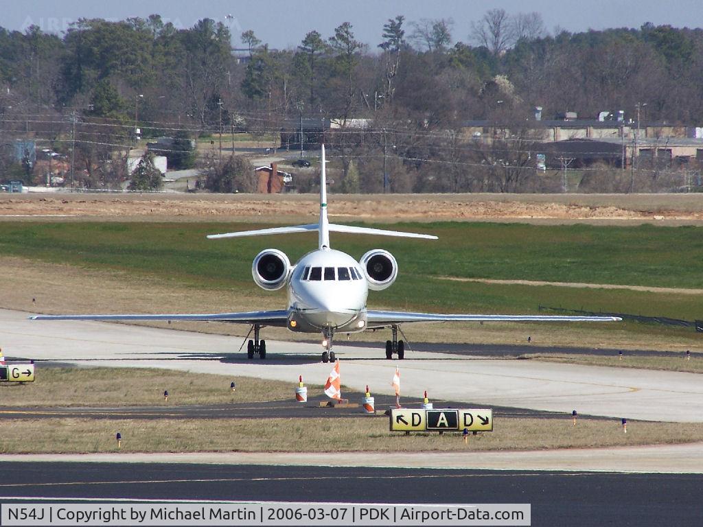N54J, 2001 Dassault Falcon 2000 C/N 141, Taxing to Mercury Air Center