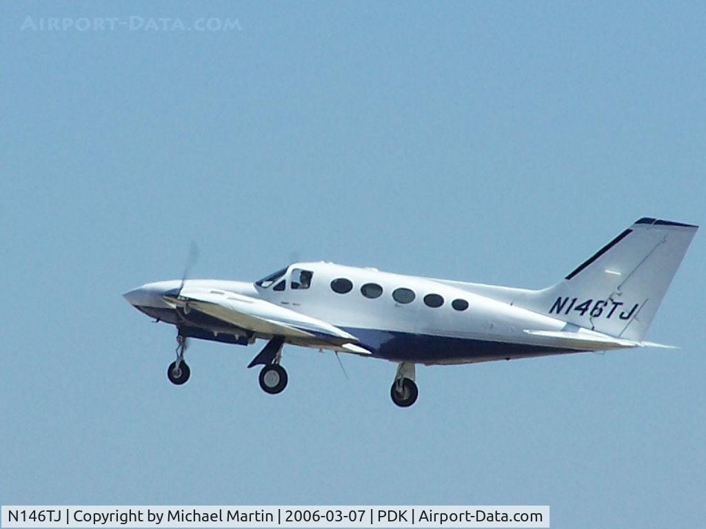 N146TJ, 1978 Cessna 421C Golden Eagle C/N 421C0500, Departing PDK - Starting to rotate gear.