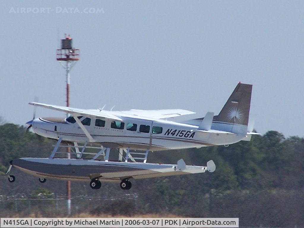 N415GA, 2004 Cessna 208 Caravan 1 C/N 20800376, Departing PDK looking for water!