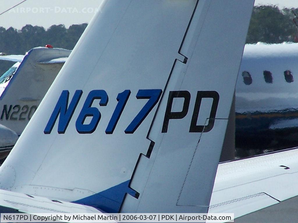 N617PD, 2002 Cessna 560XL C/N 560-5273, Someone needs new paint on the tail