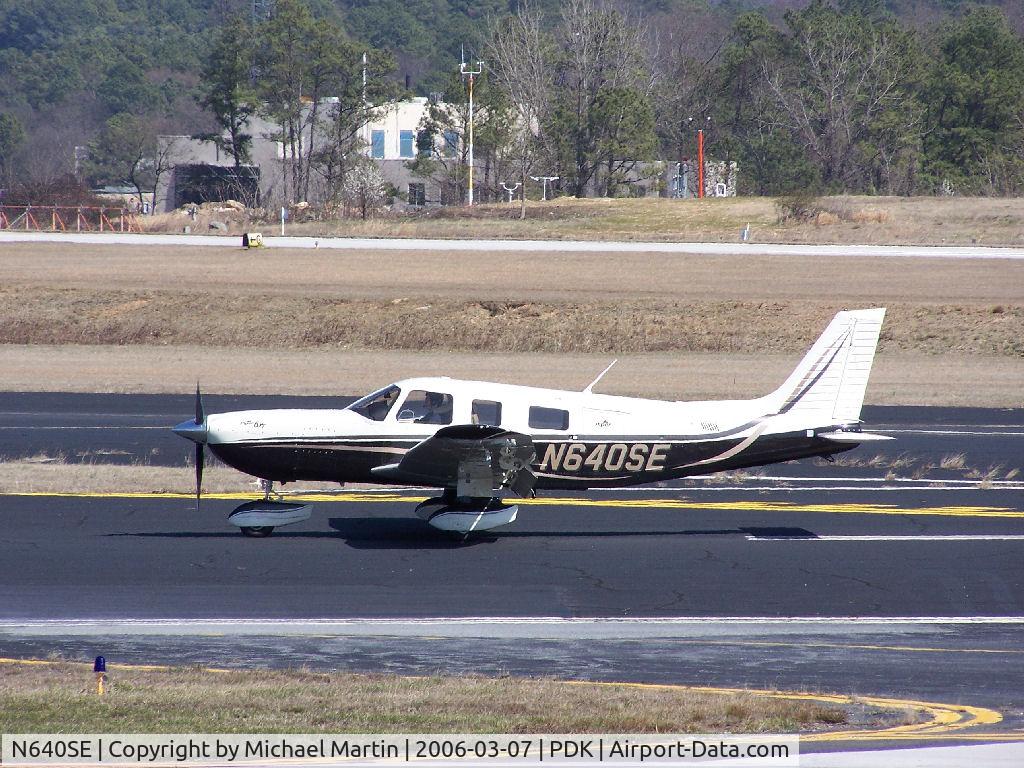 N640SE, 2005 Piper PA-32-301XTC Saratoga C/N 3255040, Taxing to Epps Air Service