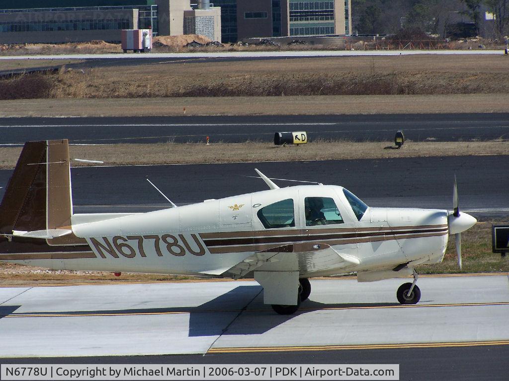 N6778U, 1963 Mooney M20C Ranger C/N 2500, Taxing to Runway 2R