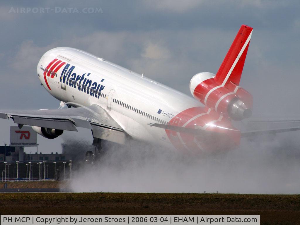 PH-MCP, 1994 McDonnell Douglas MD-11F C/N 48616, RAIN, SUN and an AIRCRAFT