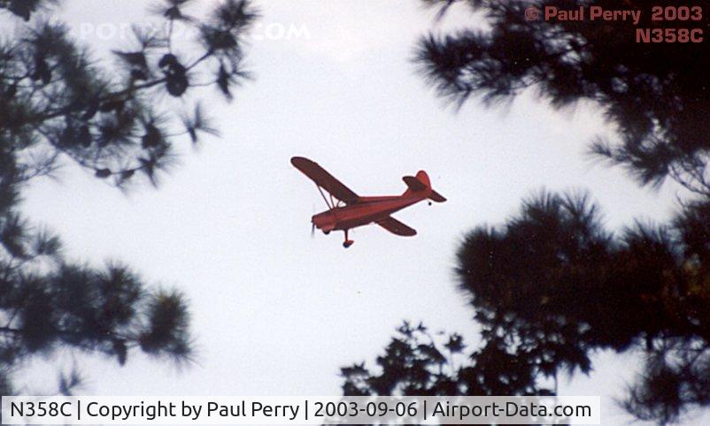 N358C, 1947 Stinson 108-2 Voyager C/N 108-3358, Catching a quick peek between the trees