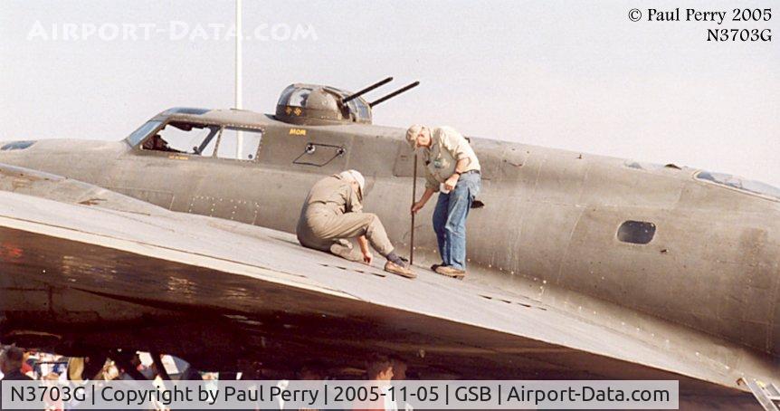 N3703G, 1945 Boeing B-17G Flying Fortress C/N 44-83546-A, Two old pros checking the fuel state of the Memphis Belle