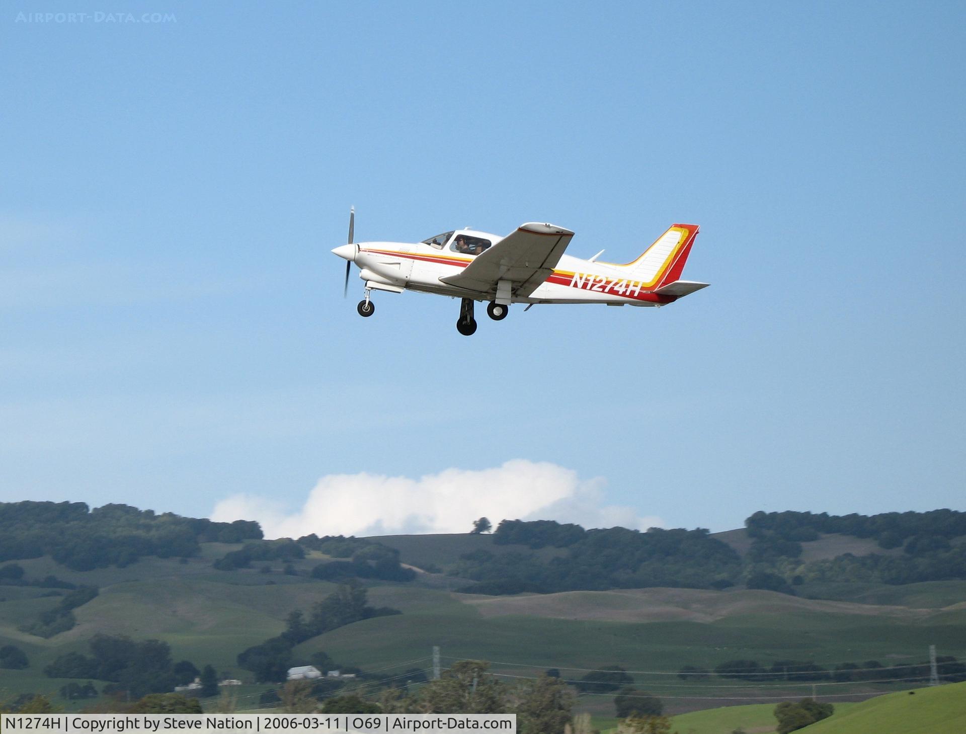 N1274H, Piper PA-28R-201T Cherokee Arrow III C/N 28R-7703020, 1977 Piper PA-28T-201T climbing out from Petaluma, CA