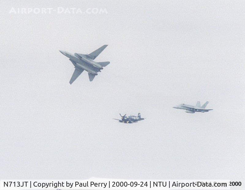 N713JT, 1945 Vought F4U-4B Corsair C/N 97143, The late great Joe Tobul leads the Legacy Flight, as the Tomcat breaks.  Farewell to both